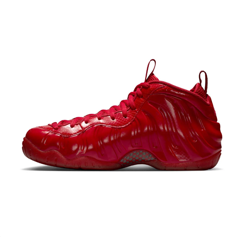 Nike Glossy Red Sneakers with Sculpted Upper and Tonal Swoosh