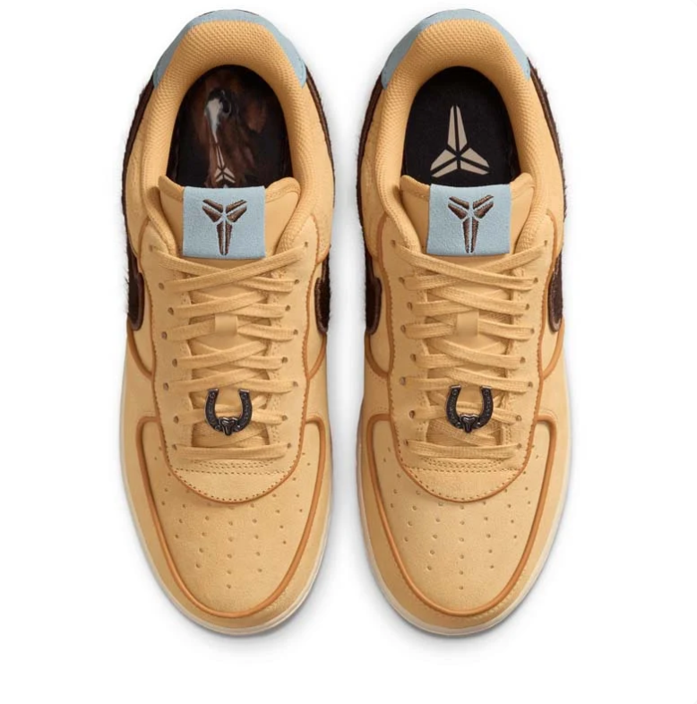 Nike Golden Tan Low-Top Sneakers with Dark Brown Swoosh and Pale Blue Accents