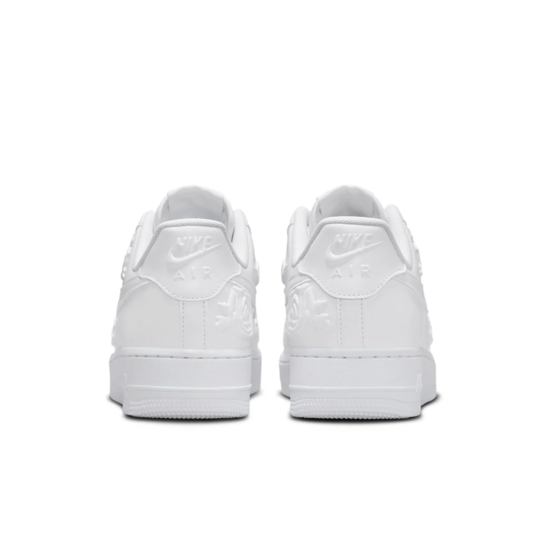 Nike White Low-Top Sneakers with Raised Rose Details