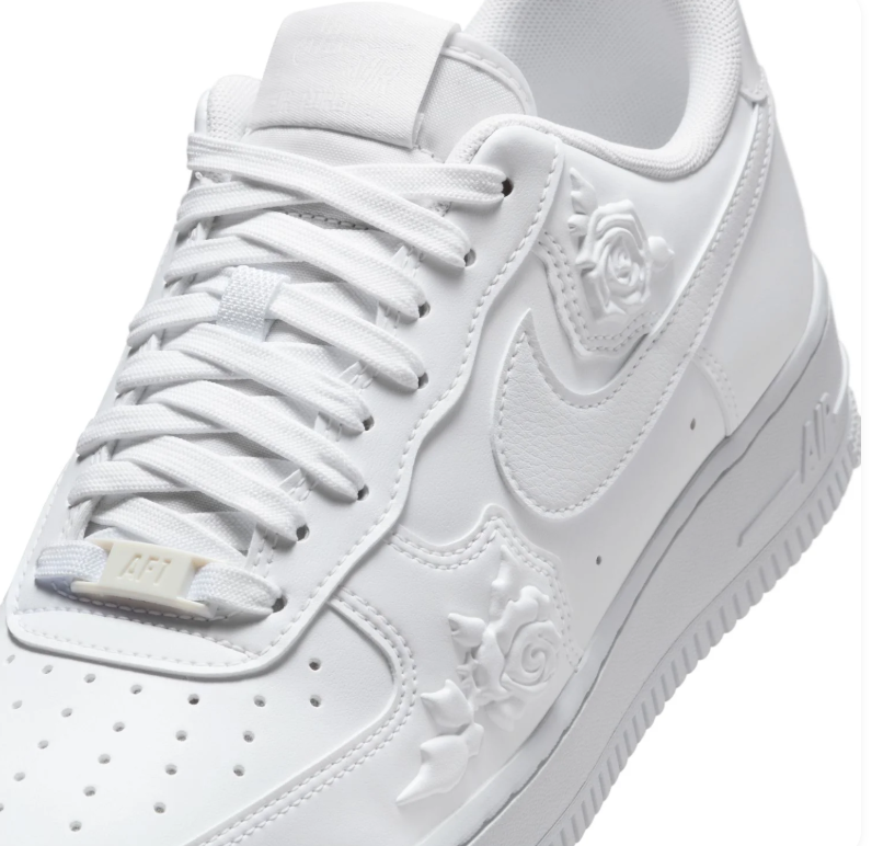 Nike White Low-Top Sneakers with Raised Rose Details