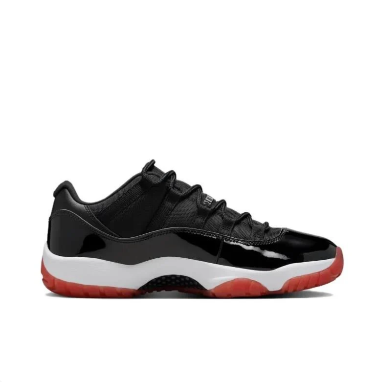 Jordan Black Low-Top Sneakers with Glossy Panels and Red Outsole