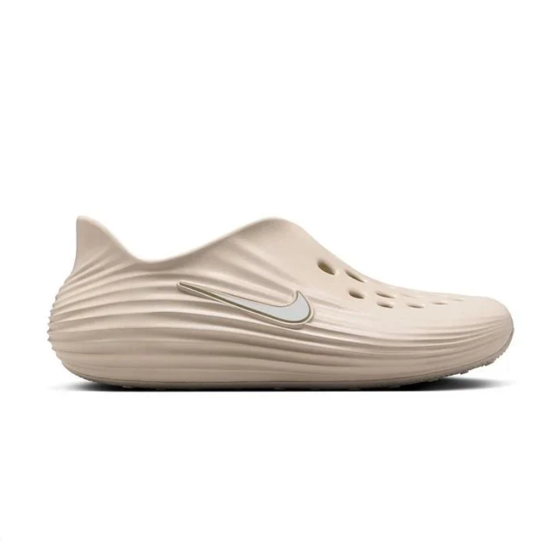 Nike Beige Slip-On Clogs with Vent Holes and Wave-Ridged Sides