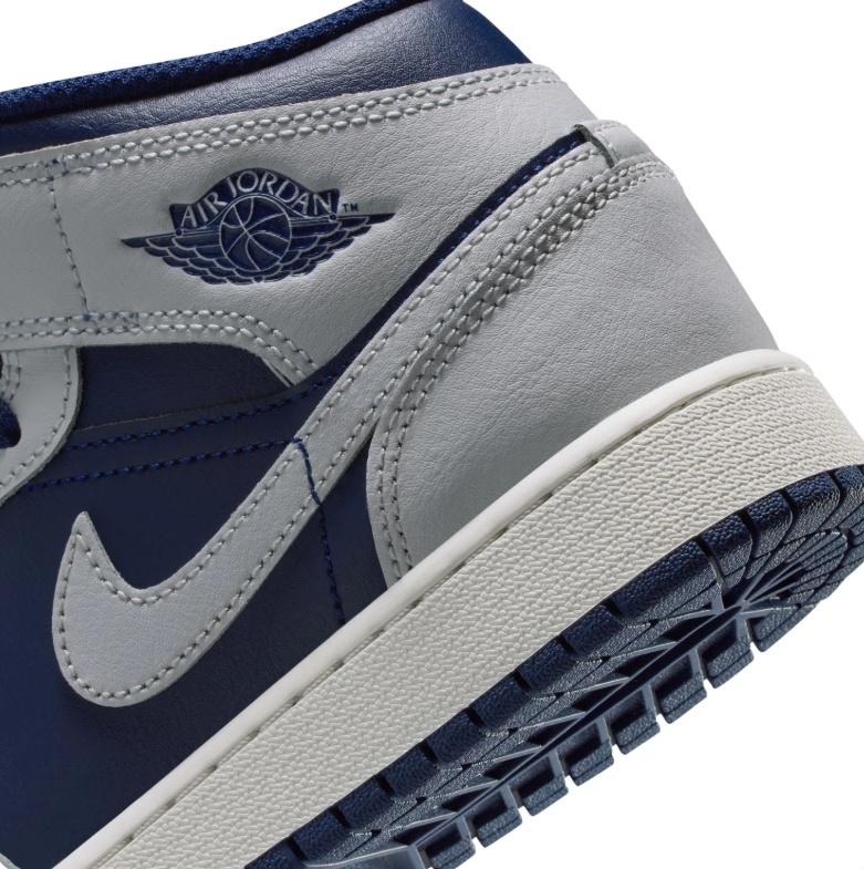 Jordan Navy Blue and Light Gray High-Top Sneakers with Red Jumpman Details